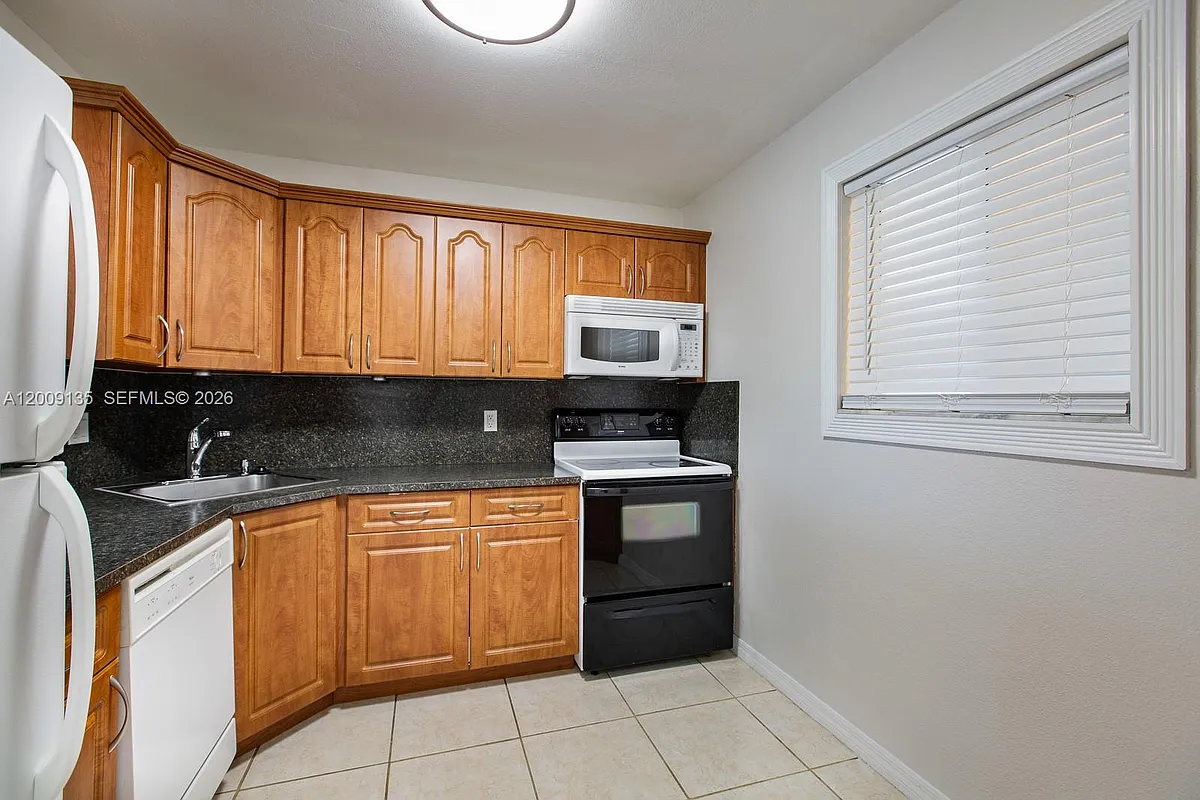 Building Photo - 8101 Camino Real #C-401