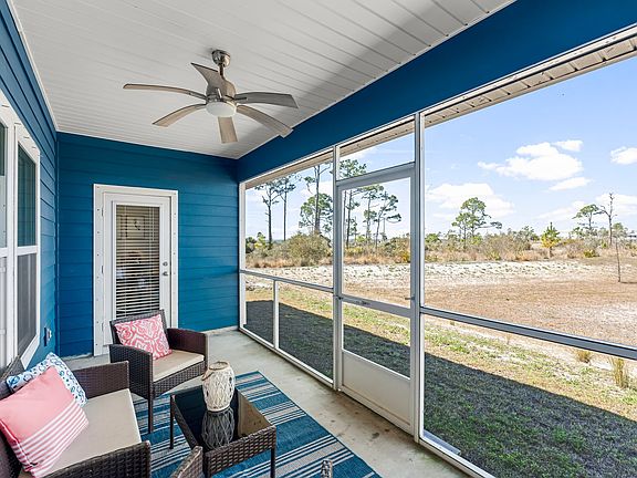 Enjoy the peaceful screened porch, perfect for morning coffee or evening cocktails!