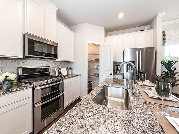 Lockwood floorplan modeled at Stoneybrook Station in Huntersville, NC.