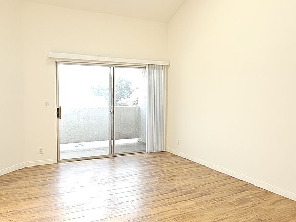 Living room, balcony, and skylight