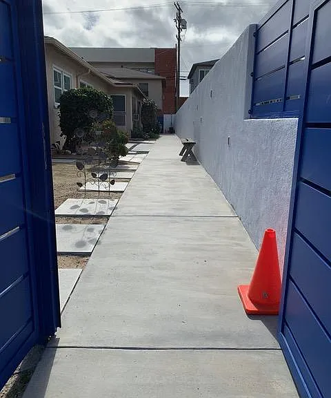 Walkway from front gate to rear of property