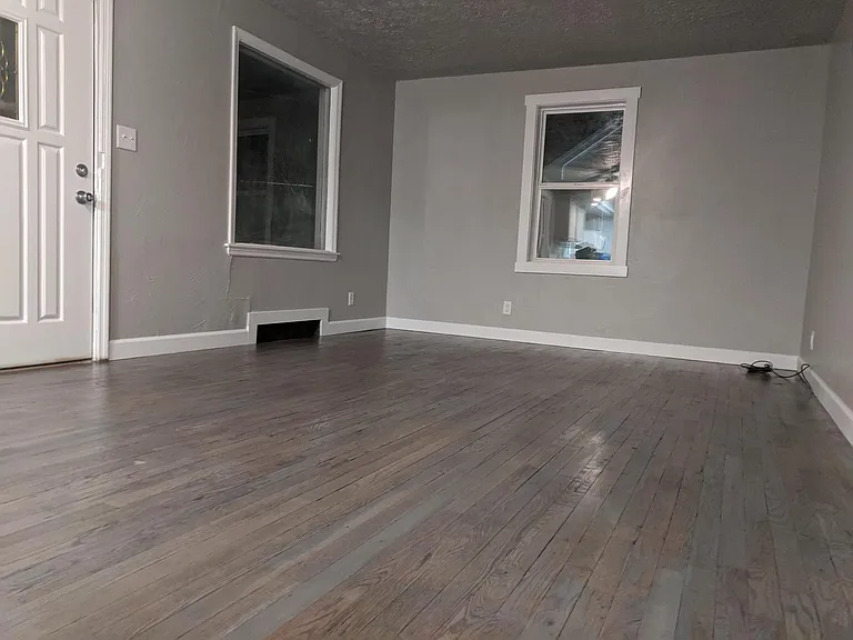 Living room with refinished hardwood floors