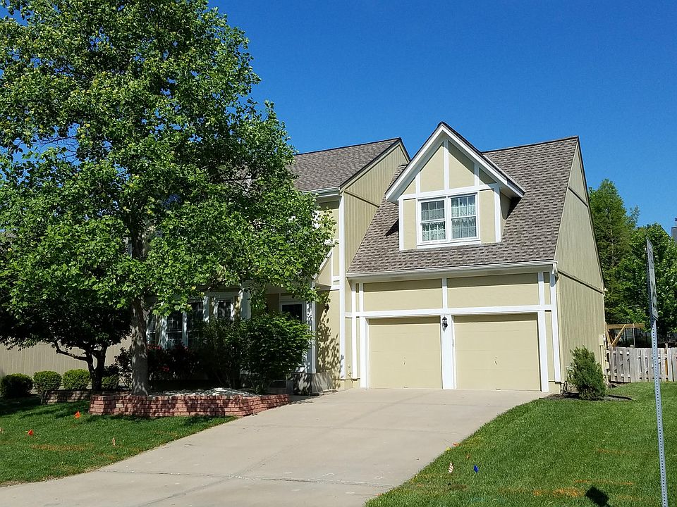 Well-maintained 2-story house, treed lot in great subdivision. Blue Valley schools.
