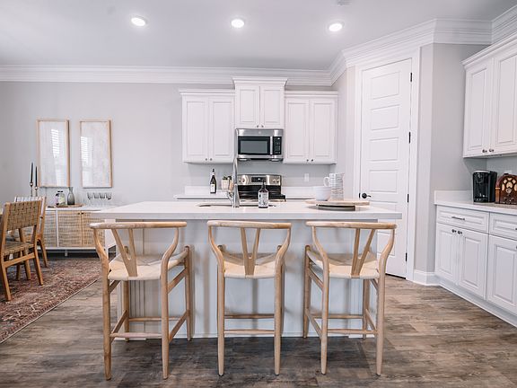 Kitchen in the Coral floorplan at a Meritage Homes community in Gulfport, MS.
