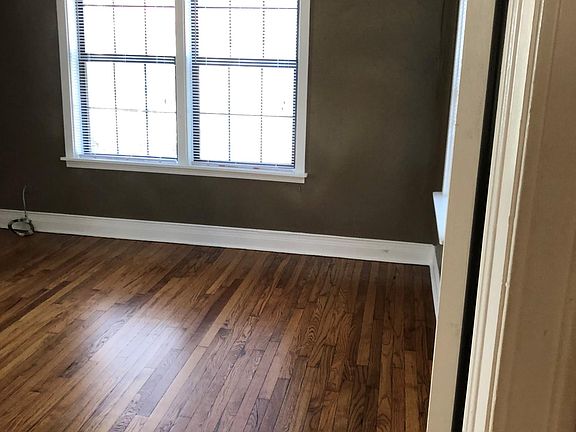 bedroom on main floor lots of light and beautiful hardwood floors