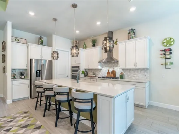 6898 Winding Cypress DR, NAPLES, FL 34114