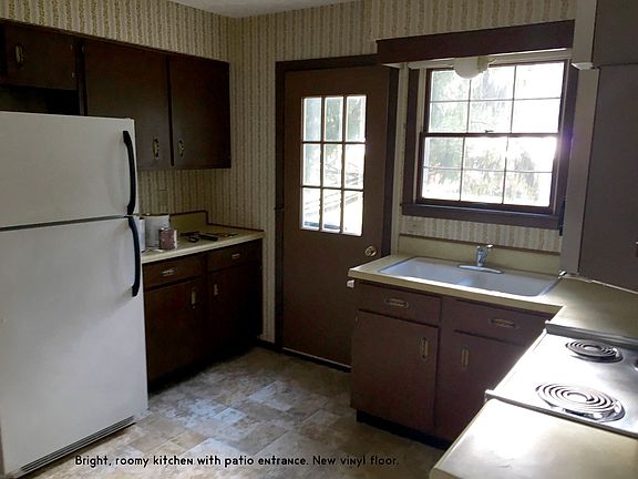 Kitchen with private patio entrance.
