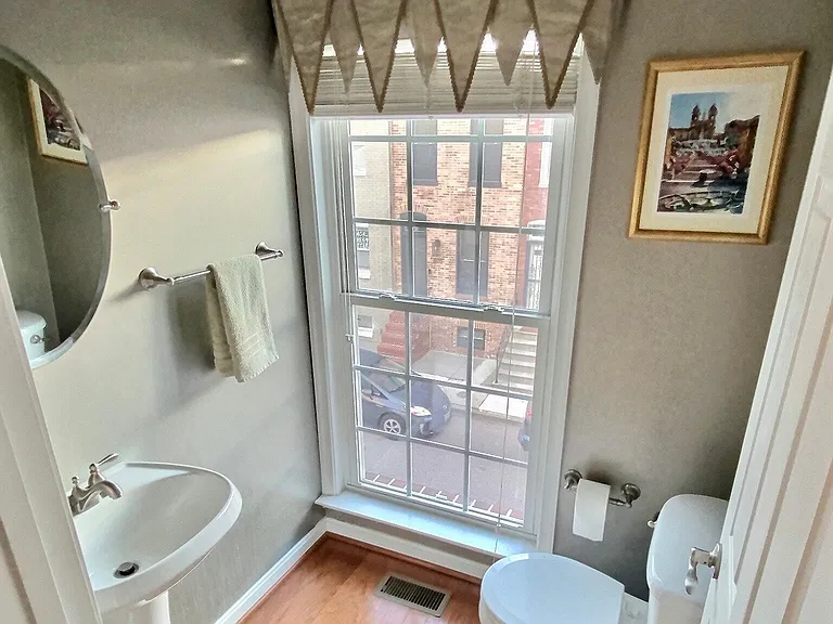 Half bath on 2nd floor, next to dining room and kitchen