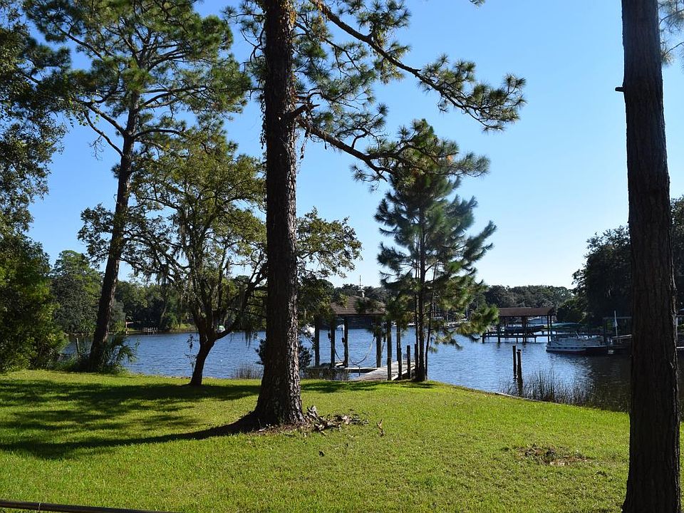waterfront with boat house & dock