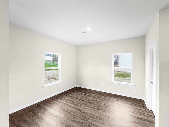 The dining room has plenty of natural light