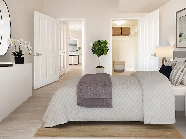 Bedroom with Hard Surface Flooring and Walk-in Closet