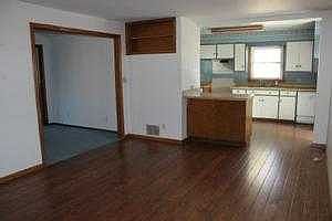 Dining area looking into kitchen