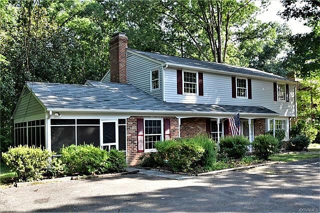 A Bon Air Classic, Brick & Vinyl Exterior, Lots of Windows for Sunlit Rooms, Excellent Areas for Entertaining and a Screened Porch For Peaceful Summer Nights (without the mosquitoes)