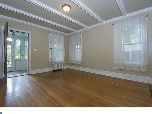 Living Room
						:
						Beautiful ceiling millwork, mahogany inlaid floor, deep sill windows