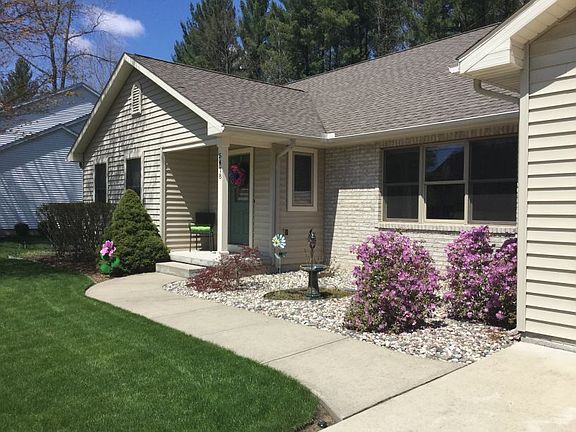 Welcome to your new home - the landscaping includes stoned beds and mulch (just freshly re-done last spring, 2015), many perennials surround the home that bloom year round, and a sprinkler system with rain gauge