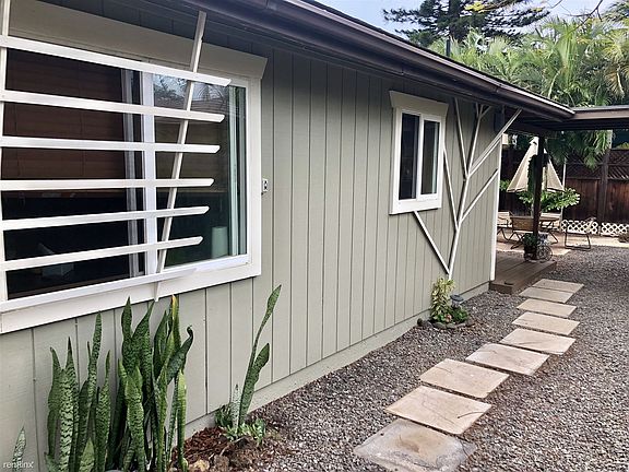 Walkway leading to patio and front door