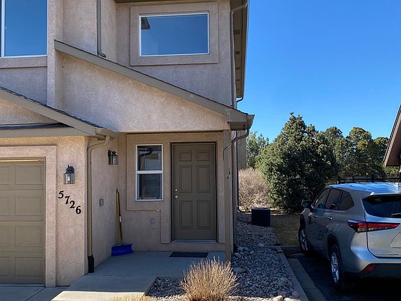 Desirable End Unit gives you extra private lawn on the side. Parking spot is not assigned, but usually open.