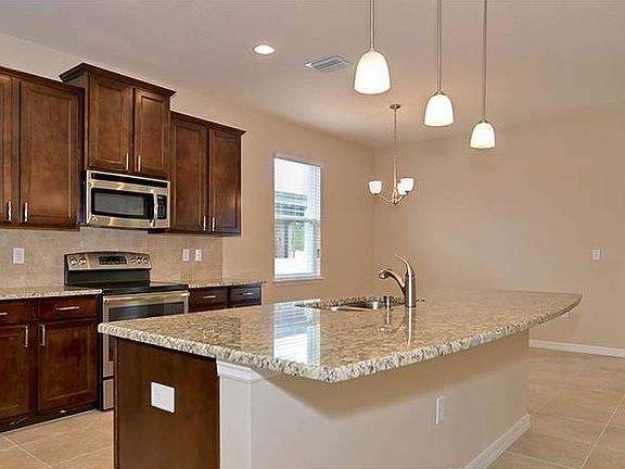 5th image of 6209 63rd Ln N