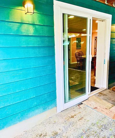 Private entrance - exterior is mostly gravel.