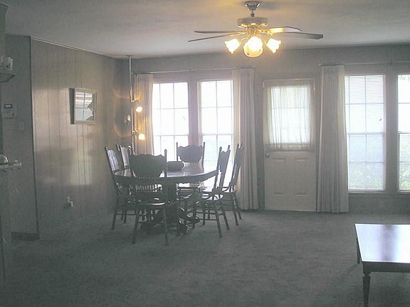 Comfortable den with lots of windows and light.