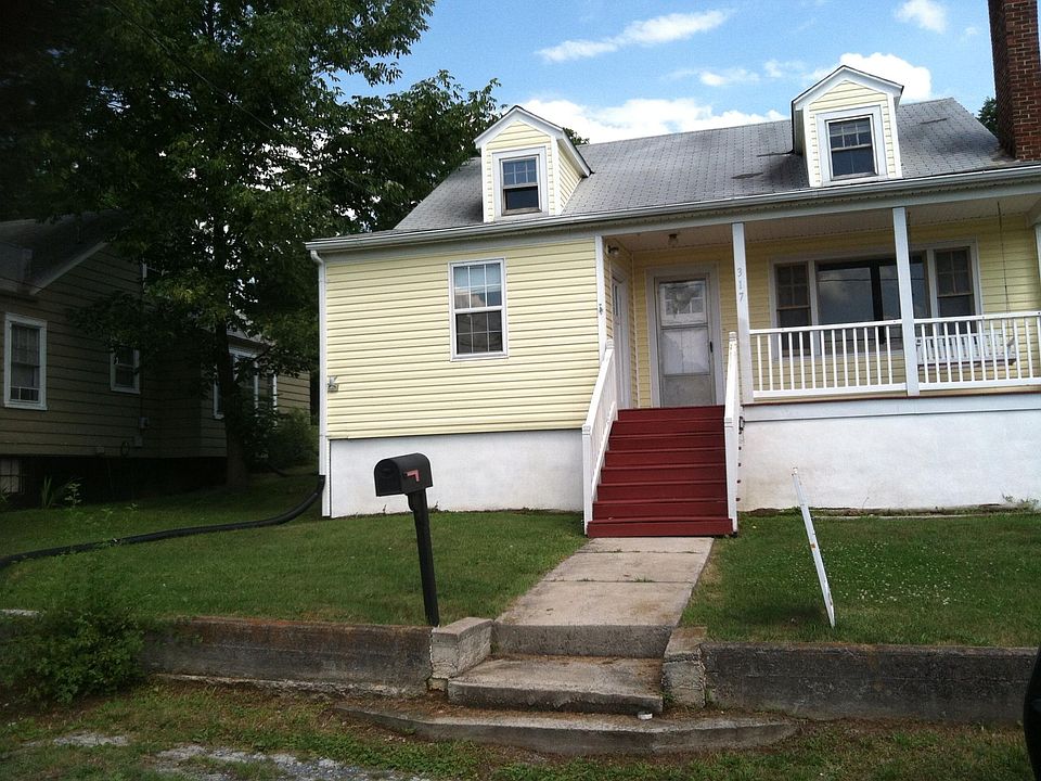 Front with porch and swing