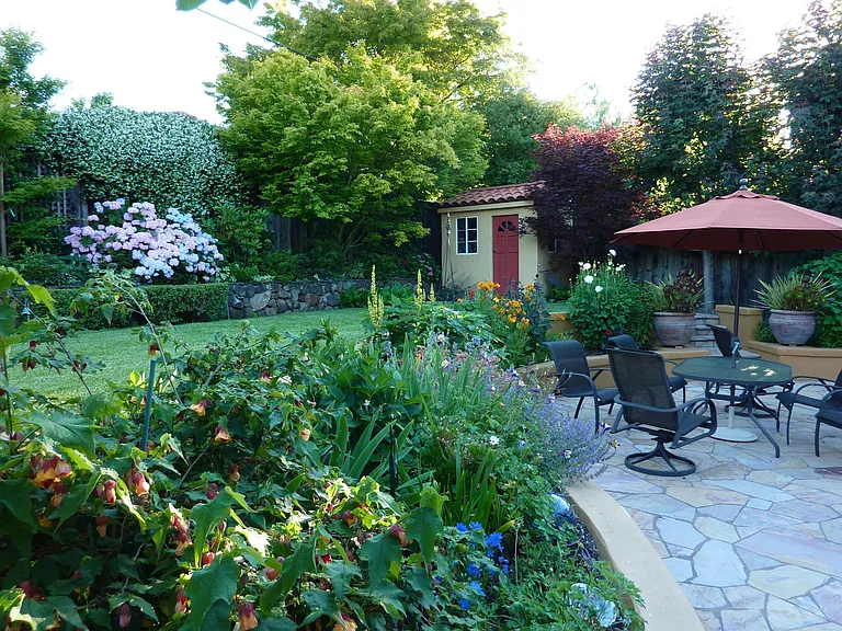 Back Yard Patio and Flower Planter Area