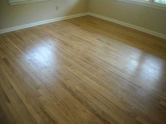 Close-up detail photo of hardwood floors throughout home