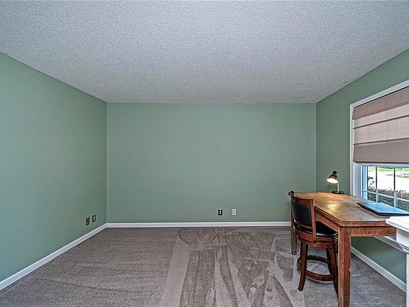 Formal Living room with brand new carpet - would make a great main floor office if needed.