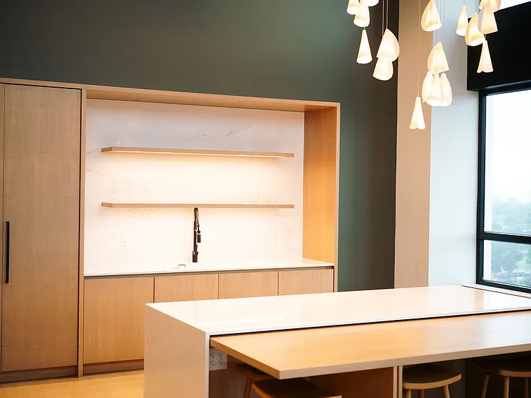 Gather with neighbors in your stylish community lounge