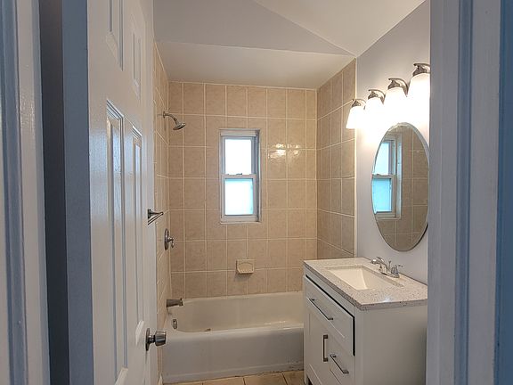 Full bathroom with tub and shower combo on 3rd floor (where the 3 bedrooms are).