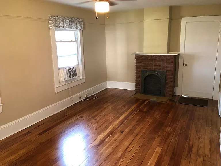 Living room and (sealed) fireplace.