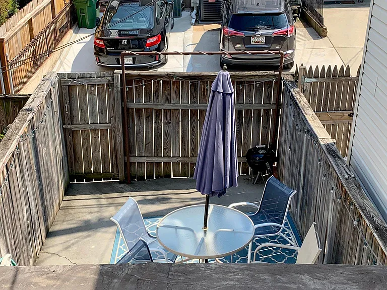 Overlooking fenced-in rear Patio perfect for company!