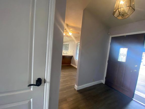 Kitchen to right, stairs to left