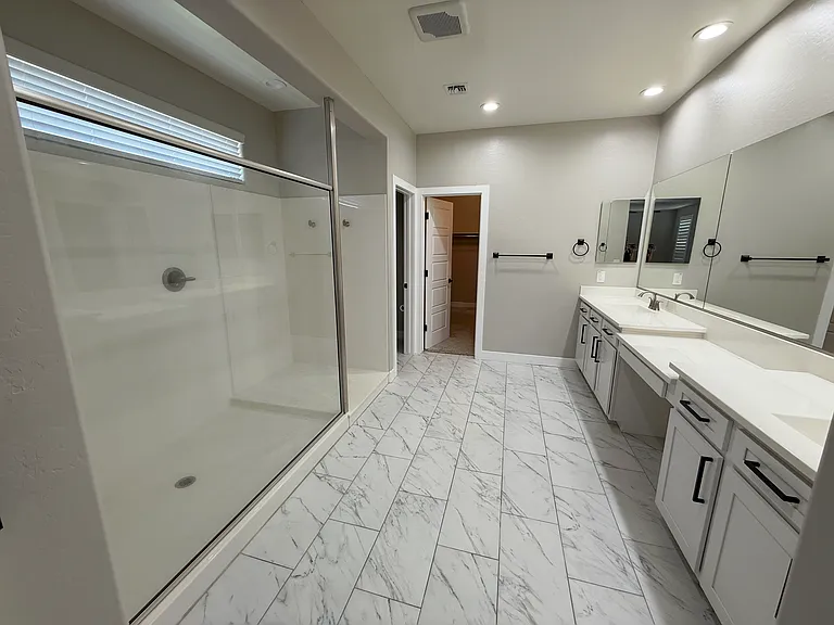 PRIMARY BATHROOM WITH EXTENDED SHOWER