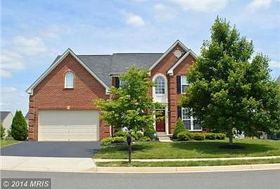 Brick front on .29 acre level lot with fenced yard