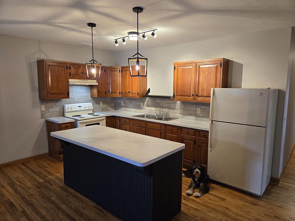Roll out your pie crusts and cookie doughs on this extra large island or setup your buffet and share a meal here. __