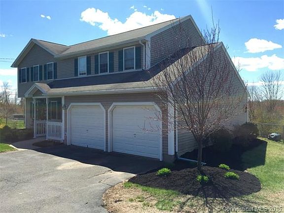 Two-car garage and front po...