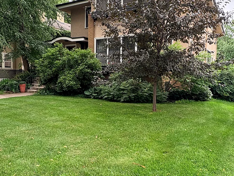 Street view of building. 
Duplex with basement apartment