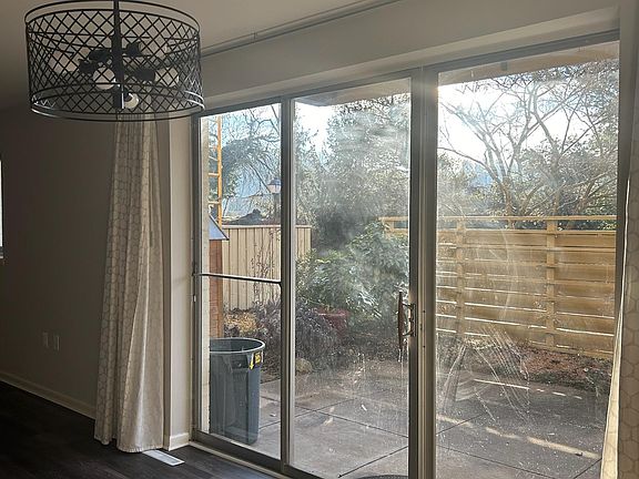 Large and private outdoor patio space with landscaped gardens.