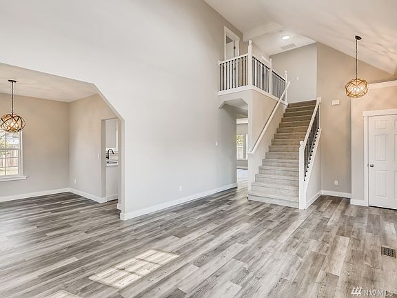 Living room flows to the dining room!  