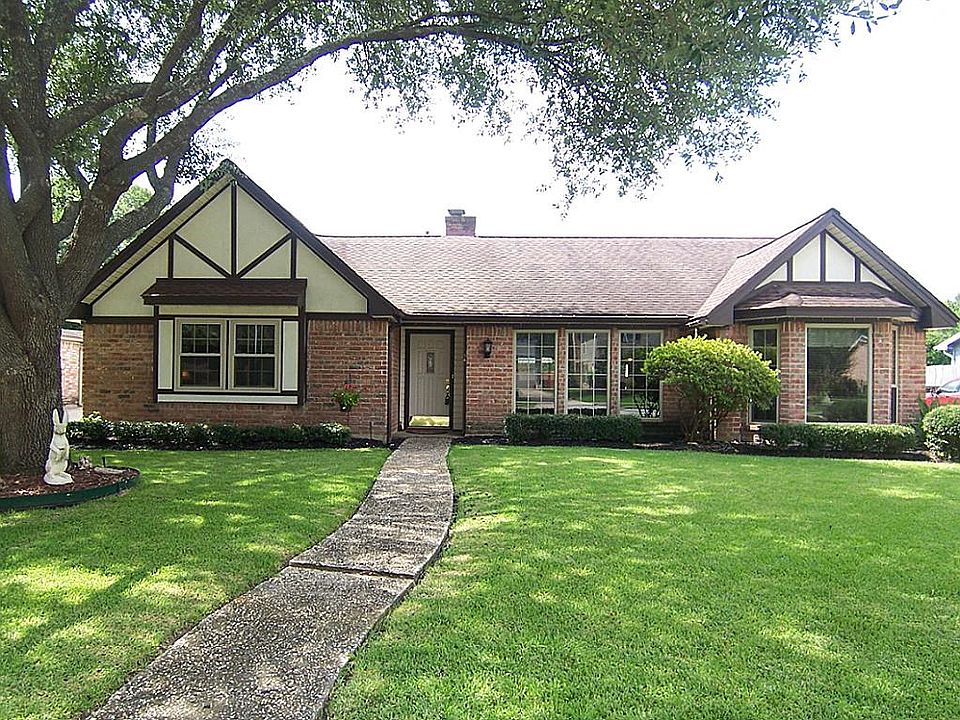 One story nestled on over 1/3 acre lot with private back yard!