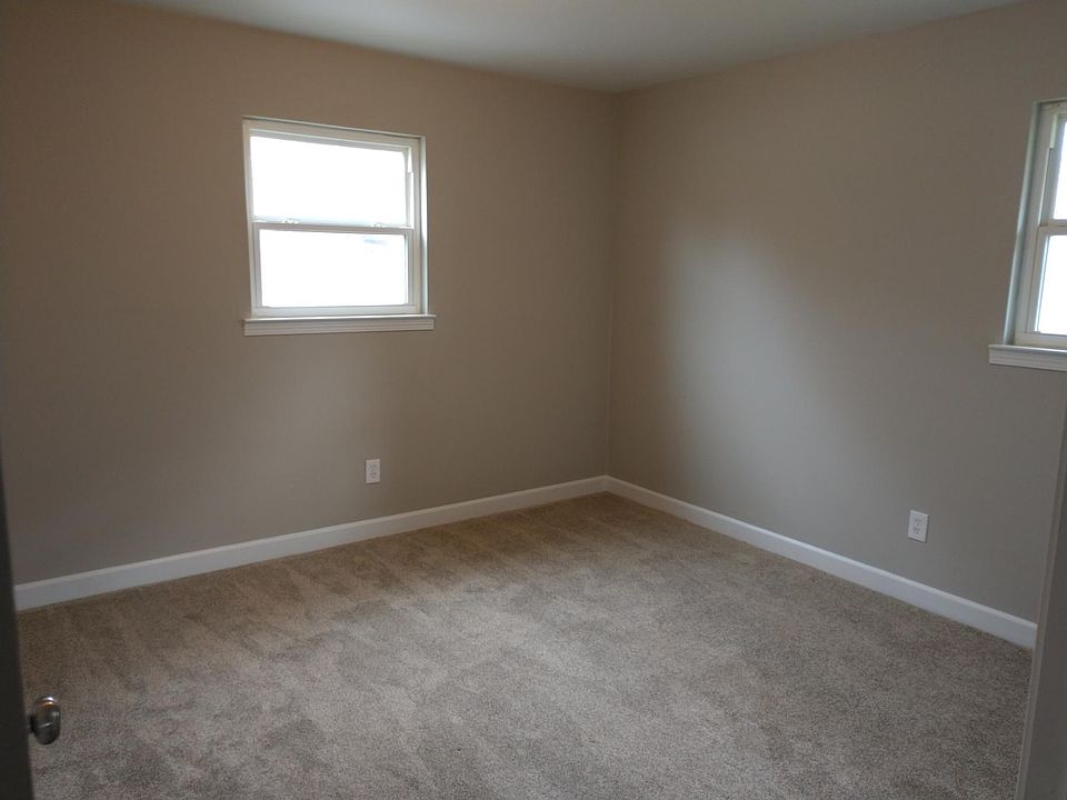 Bedroom 1 features new paint, and new carpet.