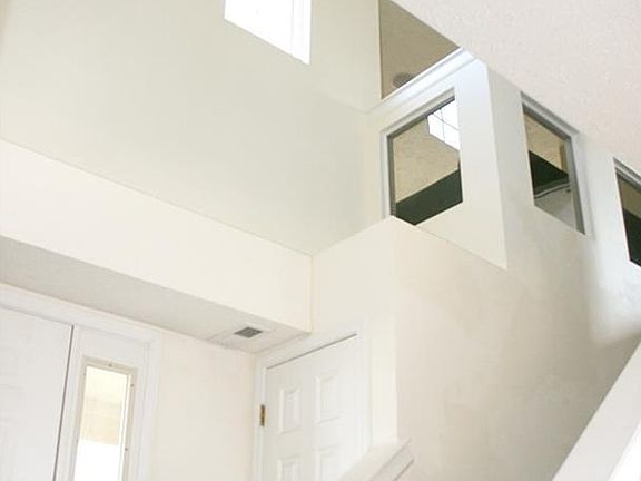 Vey unique foyer area with windows into the loft.