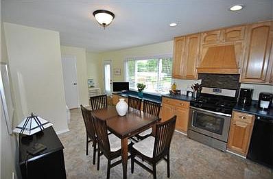 Spacious & New Kitchen, love the custom cabinets and the large window to the back yard.