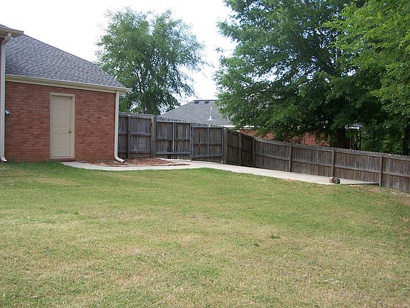 Fenced Yard w/ Concrete Pad