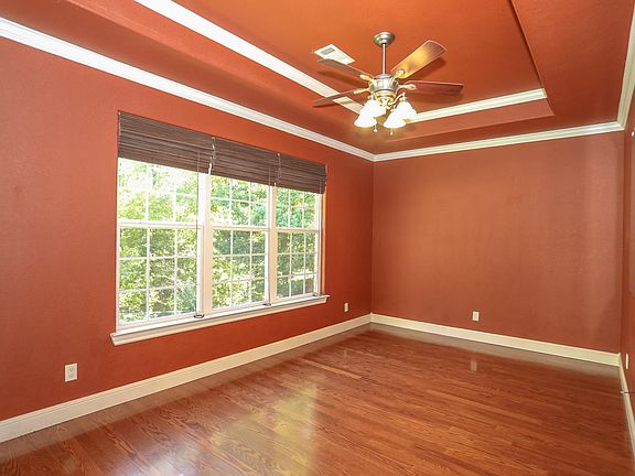 This room can either be an office or a dining room. The window looks out on the backyard.