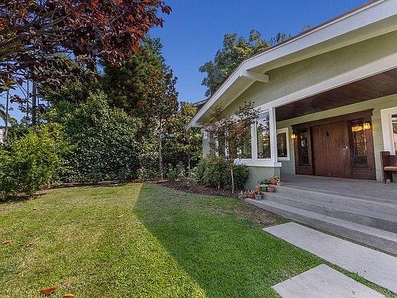 spacious porch and front yard