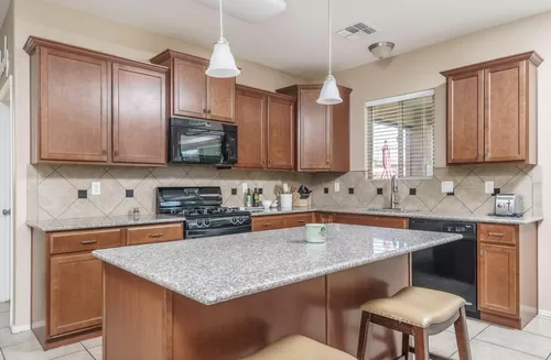 kitchen and breakfast bar - 5648 W Pecan Rd