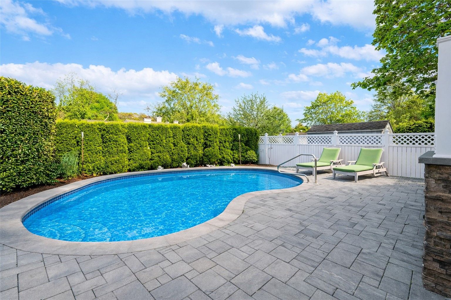  Pool and landscaping have been digitally enhanced