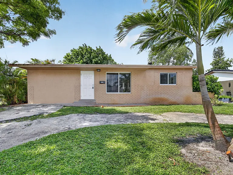 6281 NW 14th Ct — Photo 3